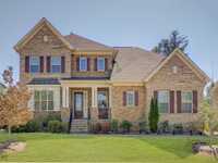 AMAZING ALL BRICK HOME IN GATED BEAR CREEK
