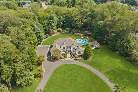 Luxury Colonial in Prestigious Hidden Pond Estates