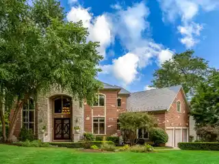 Exquisite Chef’s Kitchen with Custom Cabinetry and Appliances