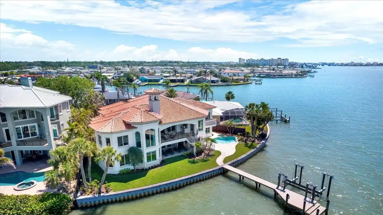 Waterfront Masterpiece in Prestigious Oakhurst Shores