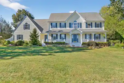 Classic Colonial with Rocking Chair Front Porch