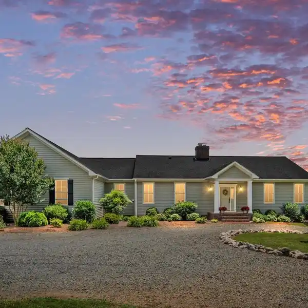 SELF-SUFFICIENT PROPERTY WITH ABUNDANT ACREAGE