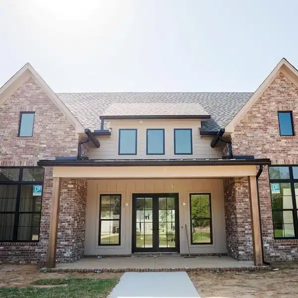 REMARKABLE NEW CONSTRUCTION IN WOODSON RIDGE