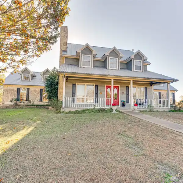 TIMELESS FARMHOUSE CHARM ON 14 ACRES