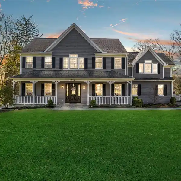 STUNNING COLONIAL WITH EXPANSIVE DECK