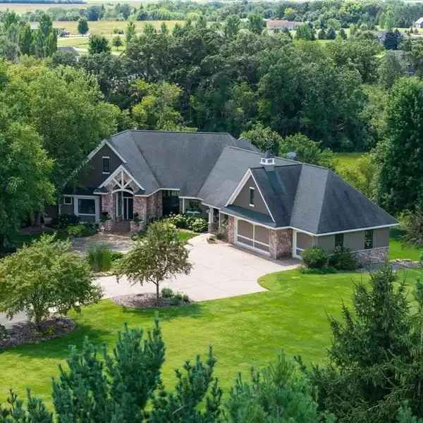 REMARKABLE CUSTOM-BUILT HOME ON OVER 13 PRIVATE ACRES