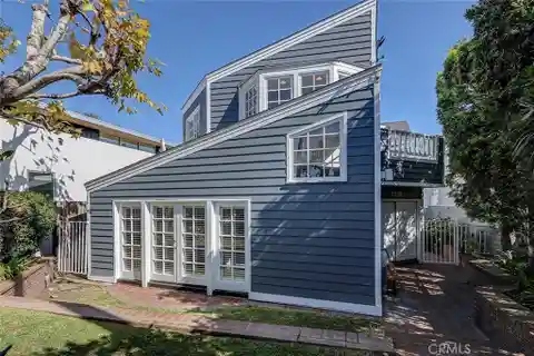 Sunlit Coastal Haven with Designer Touches