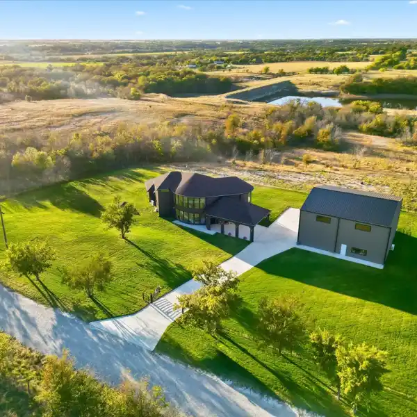 STUNNING HOME ON FIVE SPRAWLING ACRES