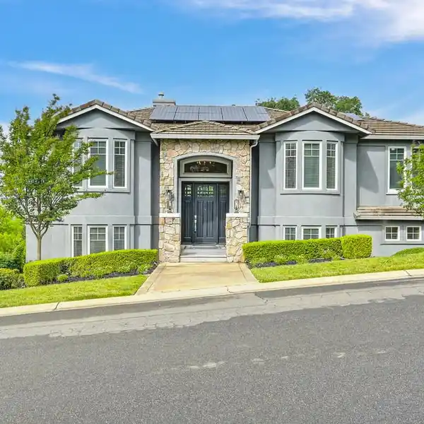 WELL-MAINTAINED CUSTOM HOME WITH SWEEPING VIEWS