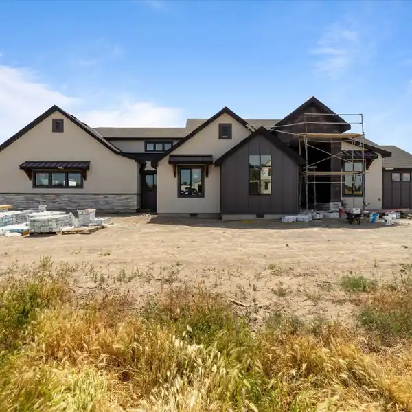 EXQUISITE NEW CUSTOM HOME WITH PANORAMIC VIEWS