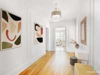 SUN-FILLED HOME WITH A HIGHLY FLEXIBLE LAYOUT