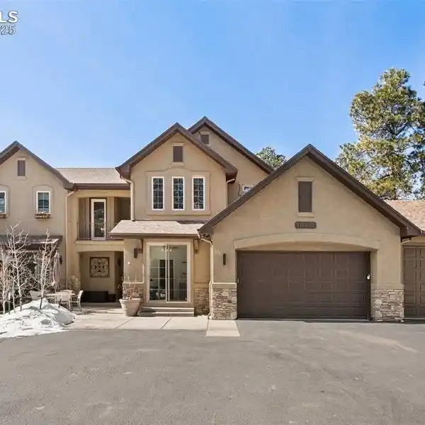 ENCHANTING CUSTOM HOME IN EXCLUSIVE GATED COMMUNITY