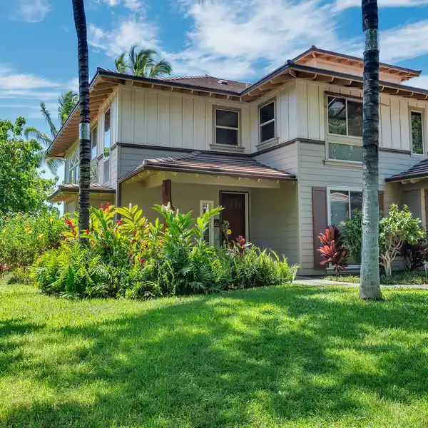 RARE END UNIT IN THE GATED PALM VILLAS COMMUNITY