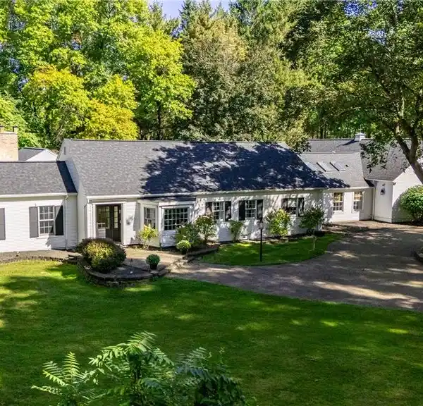 UPDATED BEAUTY ON 5.7 SECLUDED ACRES