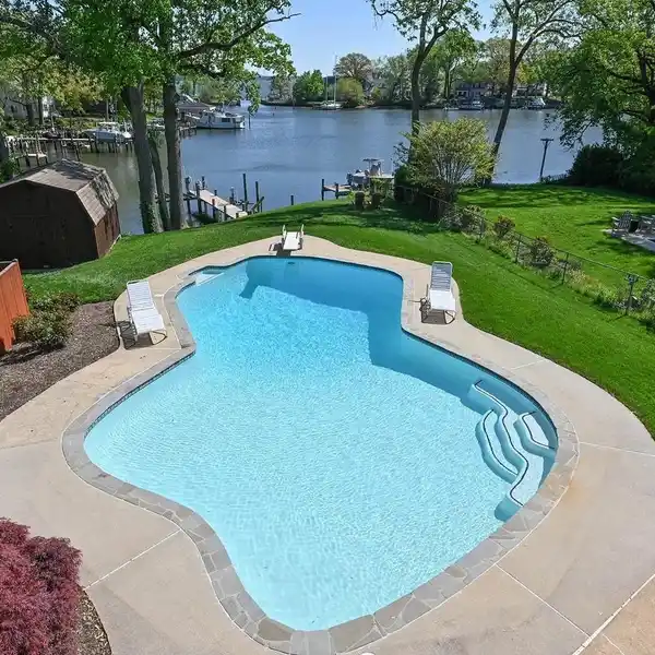 WATERFRONT OASIS WITH POOL AND PRIVATE PIER