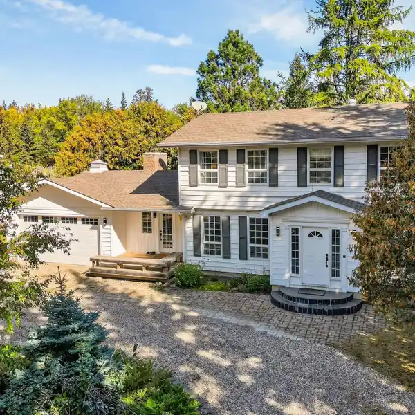 QUINTESSENTIAL FAMILY HOME ON A STUNNING ACRE