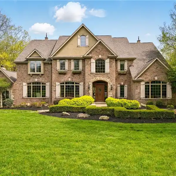 CUSTOM HOME ON PRIVATE WOODED PROPERTY