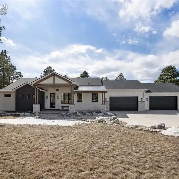 BEAUTIFULLY CRAFTED HOME ON THREE GORGEOUS ACRES