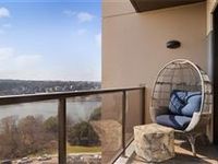 TENTH-FLOOR UNIT IN THE TOWERS OF TOWN LAKE