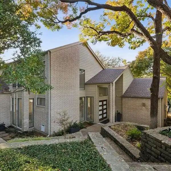 BEAUTIFULLY UPDATED HOME IN A SECLUDED CREEK SETTING