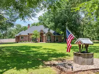 Rare Waterfront Acreage with Open Layout Home