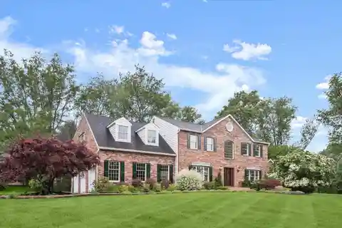 Timeless Colonial with Lush Garden Oasis