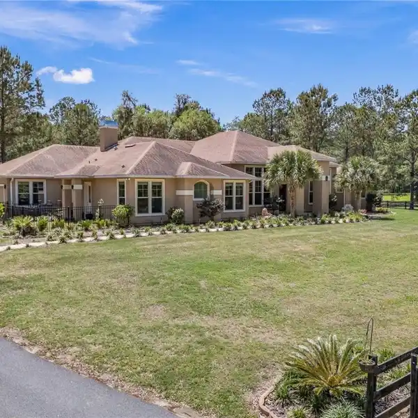 EXPERIENCE THE COMFORT AND BEAUTY THIS HOME AND 12.5 ACRES OFFER