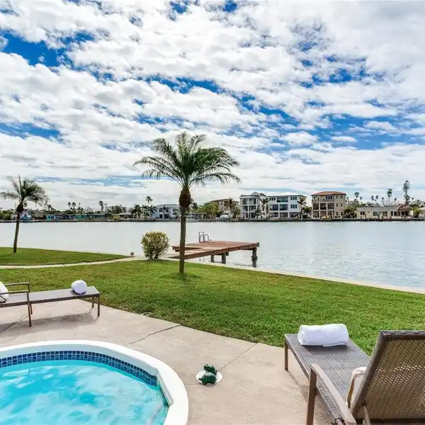 ELEVATED LUXURY WATERFRONT ESTATE WITH POOL