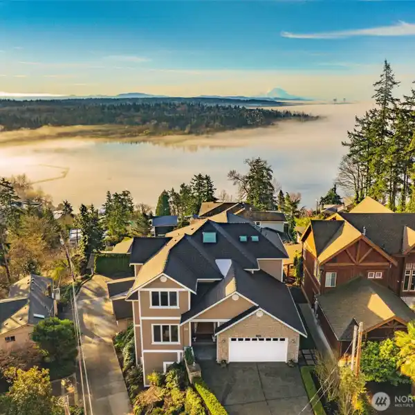 EXCEPTIONAL HOME WITH SWEEPING ELEVATED VIEWS