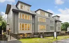 ELEGANT TOWNHOMES WITH PRIVATE COURTYARDS AND 2-CAR GARAGES