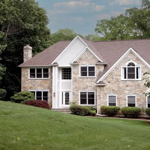 ELEVATED ELEGANCE IN DISTINGUISHED WOODED ENCLAVE