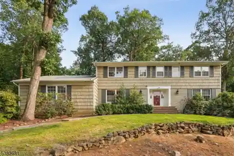 Lushly Landscaped Colonial with Glass Breakfast Room