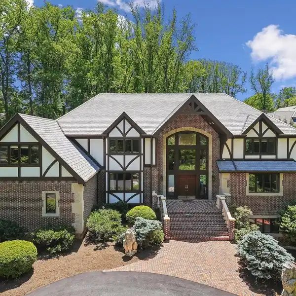 CUSTOM TUDOR IN THE PERFECT SECLUDED LOCATION