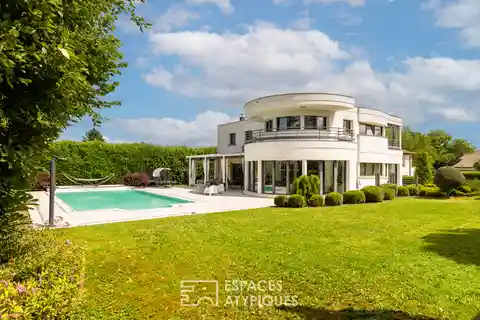 Spacious Home Surrounded by Private Wooded Grounds