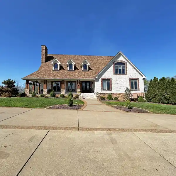 GORGEOUS CUSTOM HOME ON FIVE ACRES