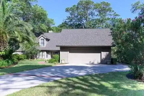 Light-filled Home with Manicured Grounds
