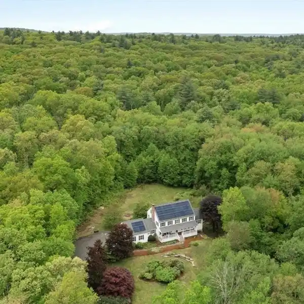 STUNNING FARMHOUSE ON OVER FOUR ACRES
