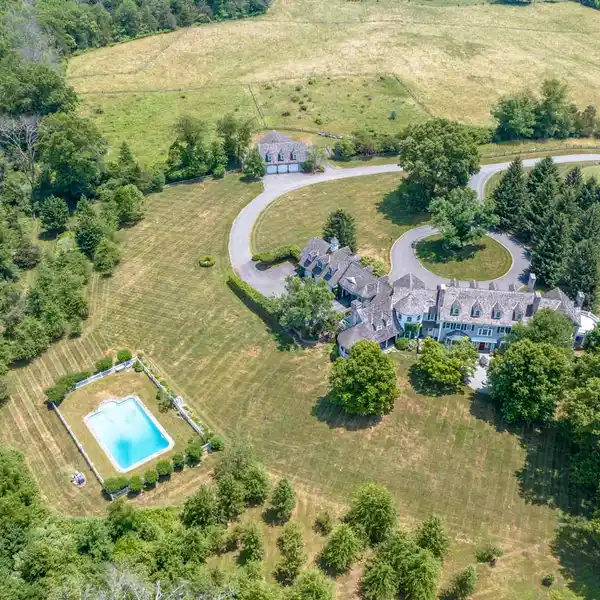 EXQUISITE COLONIAL REVIVAL ESTATE ON 43 ACRES
