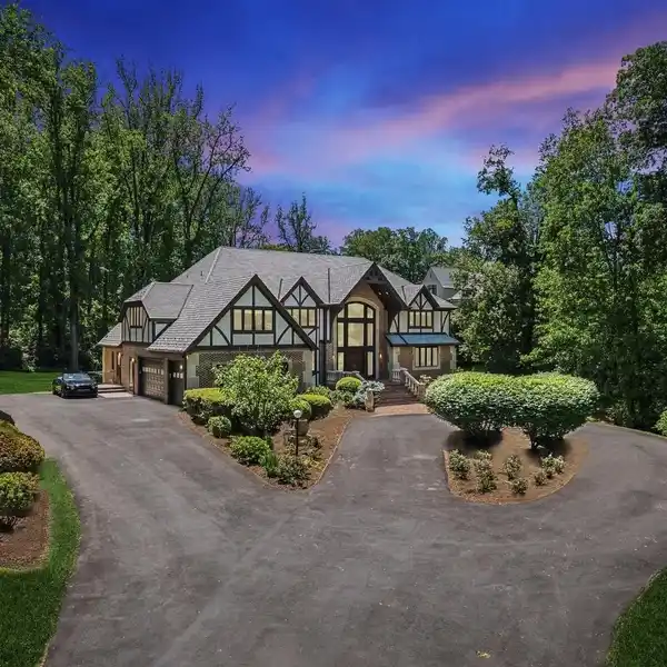 CUSTOM TUDOR IN THE PERFECT SECLUDED LOCATION