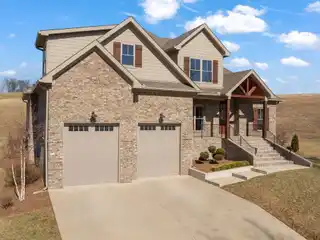 Custom Home in the Prestigious Olde Stone Golf Course Community