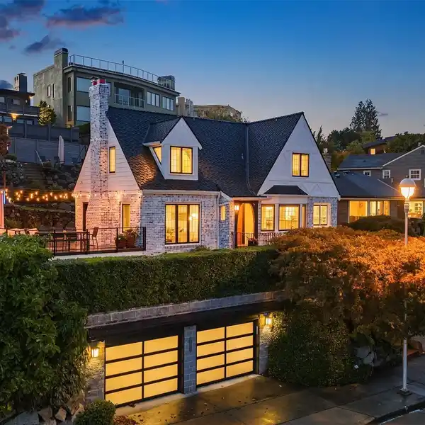 STORYBOOK TUDOR ON MAGNOLIA’S COVETED WEST HILL