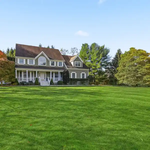 CLASSIC COLONIAL HOME WITH INVITING FAMILY SPACES