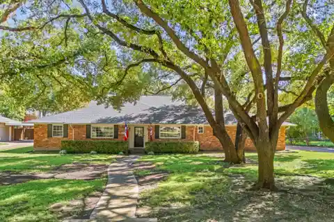 Rare Corner Estate with Grand Oaks and Pool