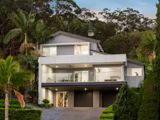 Beautifully Composed Home Surrounded by Tropical Gardens