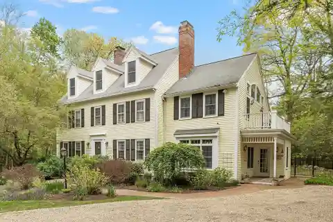 Timeless Colonial Charm on Private Acre Lot