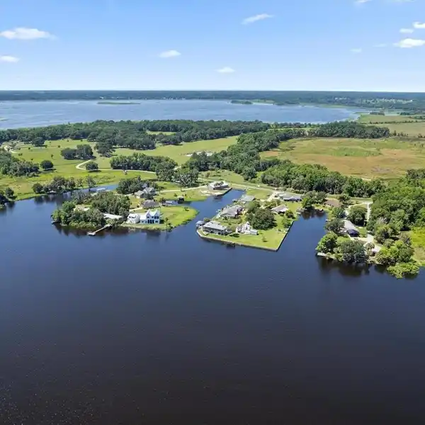 CUSTOM LAKEFRONT MASTERPIECE WITH UNBEATABLE WATER VIEWS