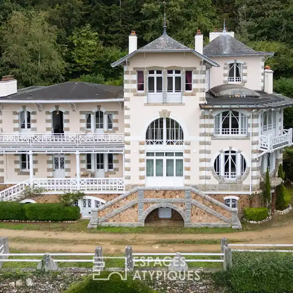 ARCHITECTURAL GEM SURROUNDED BY LUSH PARKLAND