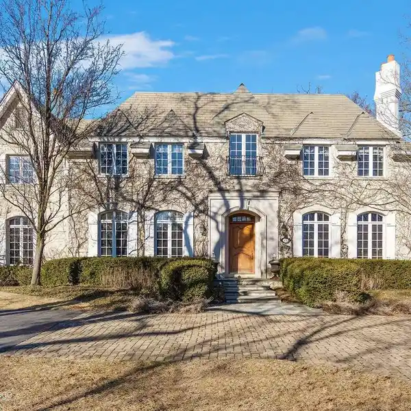 EXQUISITE CUSTOM HOME ON A SERENE LOT