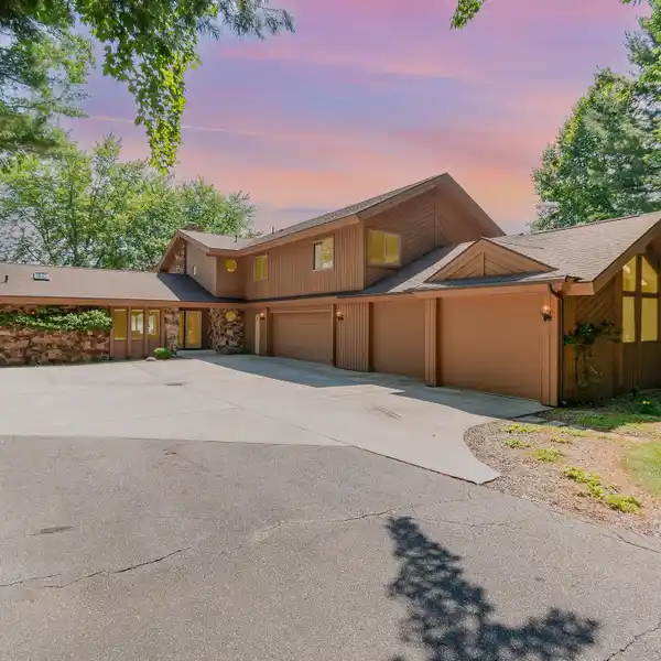 ELEGANT LIVING WITH CUSTOM LAKEFRONT AMENITIES