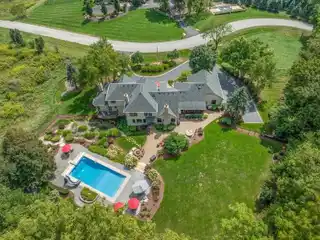 Elevated Elegance Backing Nature Preserve Views